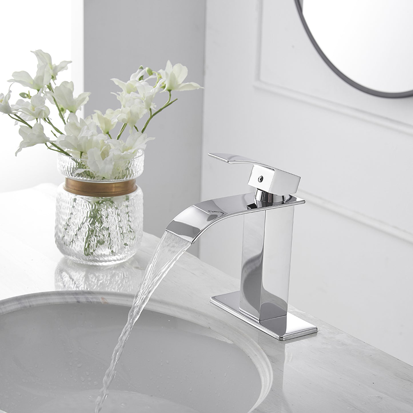 Waterfall Single Hole Single-Handle Low-Arc Bathroom Faucet With Pop-up Drain Assembly in Polished Chrome