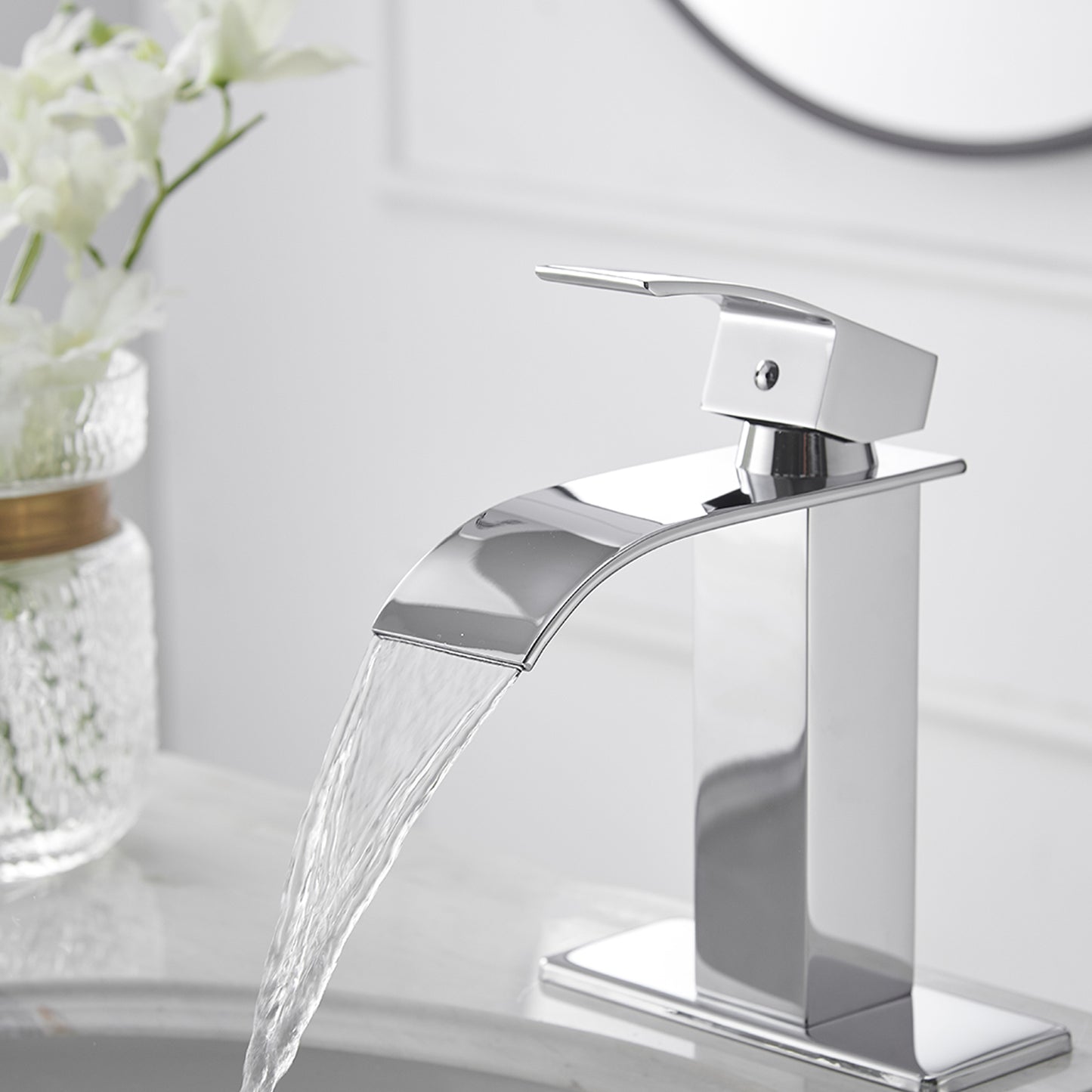 Waterfall Single Hole Single-Handle Low-Arc Bathroom Faucet With Pop-up Drain Assembly in Polished Chrome