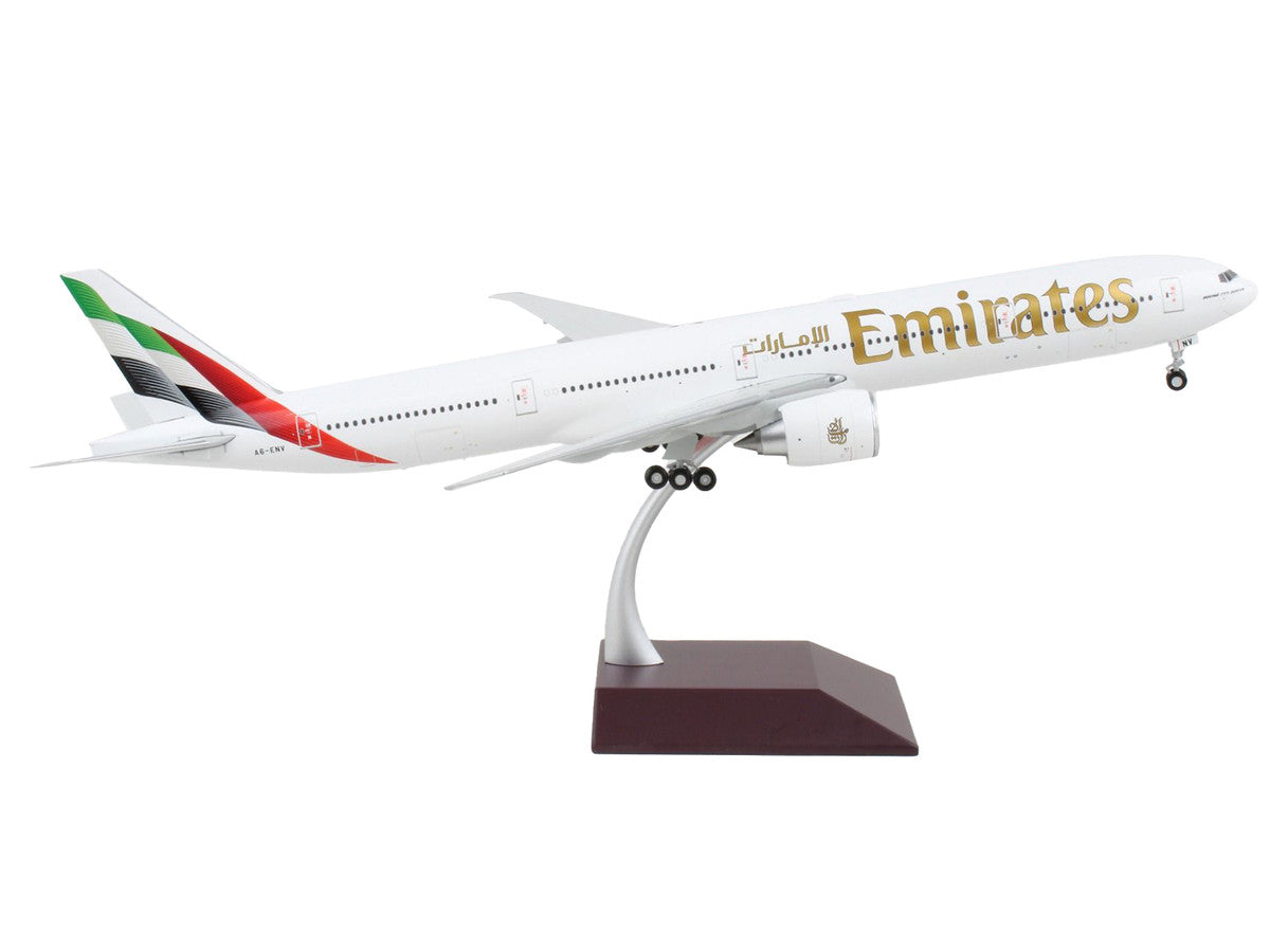 Boeing 777-300ER Commercial Aircraft "Emirates Airlines - 2023 Livery" White with Striped Tail "Gemini 200" Series 1/200 Diecast Model Airplane by GeminiJets-1