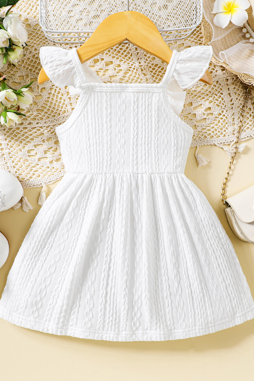 baby-girl-decorative-button-ruffle-shoulder-textured-dress