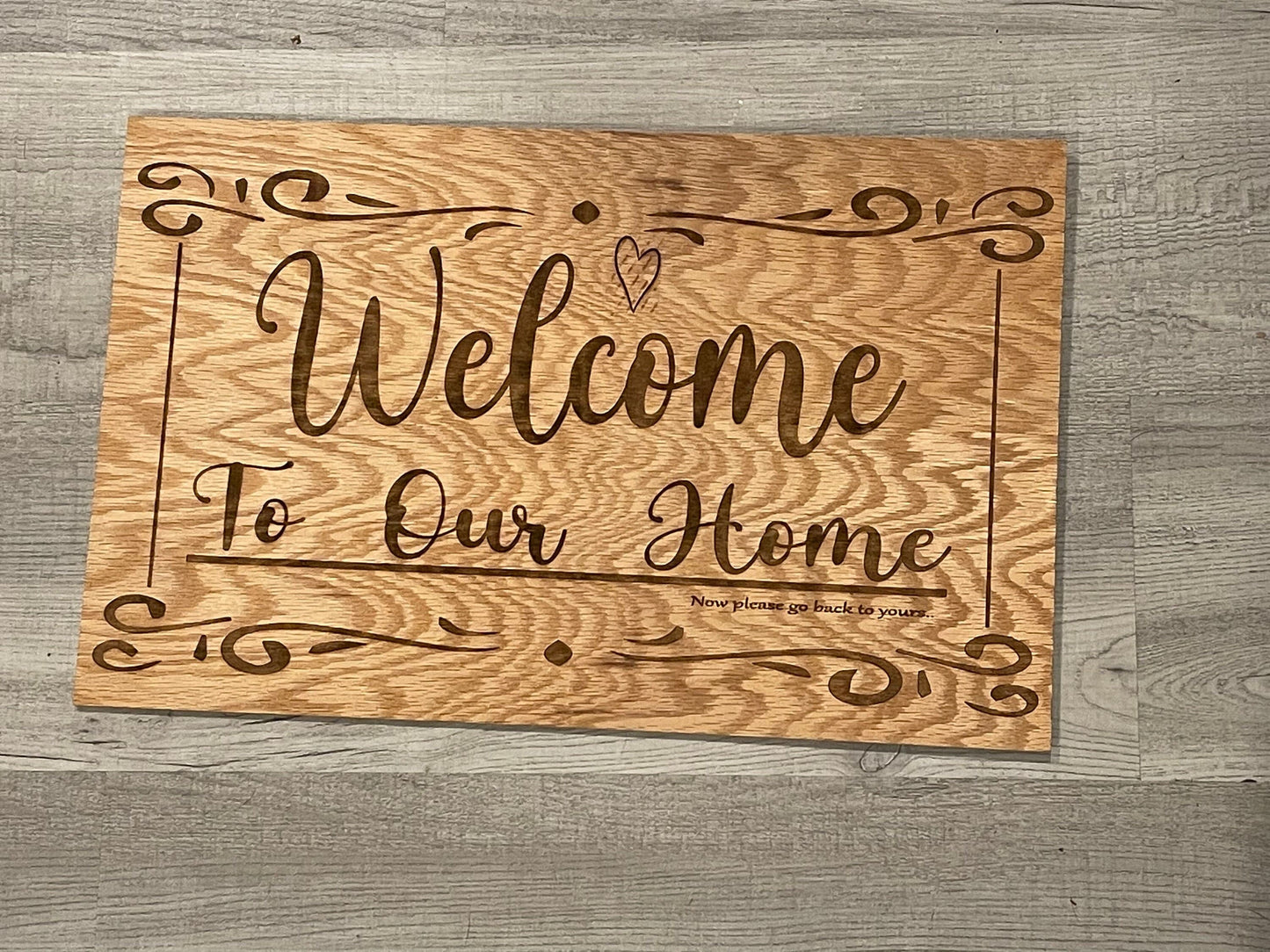 Welcome To Our Home (Now Please Go Back To Yours…) Wooden Sign-0